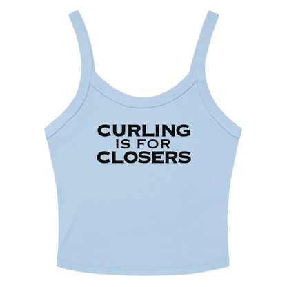 "Curling Is For Closers" printed on a solid baby blue blend women's micro-rib tanktop laying on a flat surface amongst sunglasses and shorts