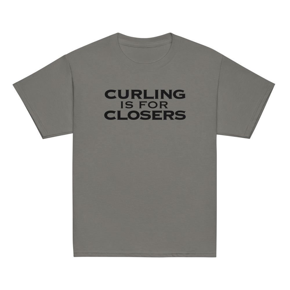 "Curling Is For Closers" printed on a charcoal youth classic tee laying on a flat surface