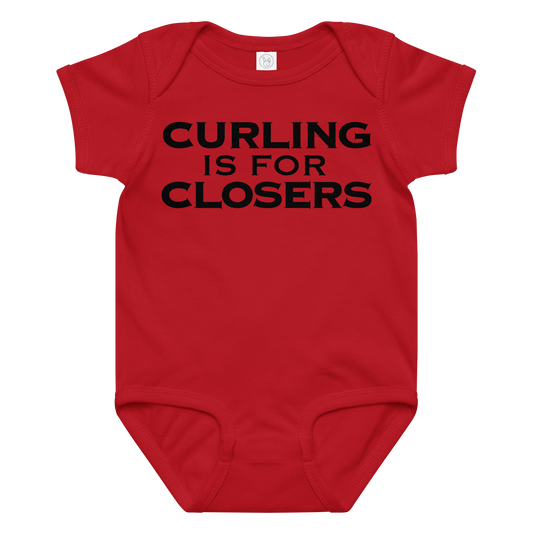"Curling Is For Closers" printed on a red baby jersey bodysuit laying on a flat surface amongst other clothes