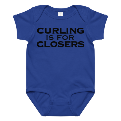 "Curling Is For Closers" printed on a royal baby jersey bodysuit laying on a flat surface amongst other clothes