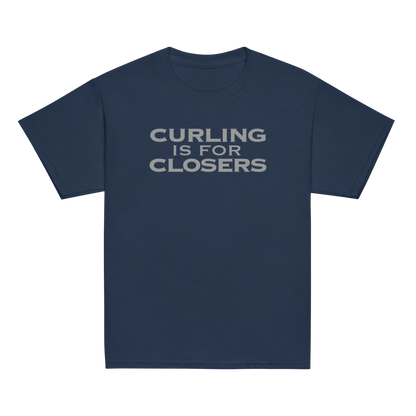 "Curling Is For Closers" printed on a navy youth classic tee laying on a flat surface