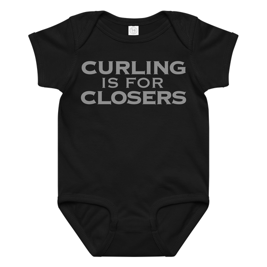 "Curling Is For Closers" printed on a black baby jersey bodysuit laying on a flat surface amongst other clothes