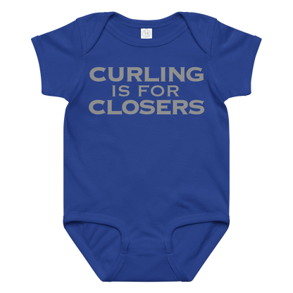 "Curling Is For Closers" printed on a royal baby jersey bodysuit laying on a flat surface amongst other clothes