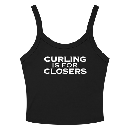 "Curling Is For Closers" printed on a solid black blend women's micro-rib tanktop laying on a flat surface amongst sunglasses and shorts