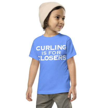 "Curling Is For Closers" printed on a heather columbia blue toddler short sleeve tee worn by a male wearing a cap