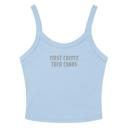 "First Coffee  Then Chaos" printed on a solid baby blue blend women's micro-rib tanktop laying on a flat surface amongst sunglasses and shorts