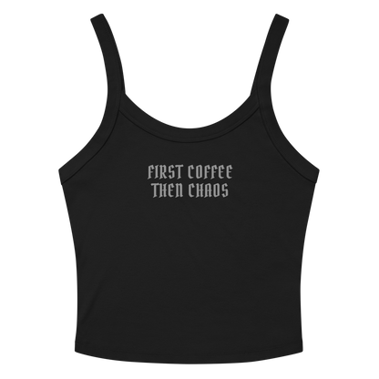"First Coffee  Then Chaos" printed on a solid black blend women's micro-rib tanktop laying on a flat surface amongst sunglasses and shorts