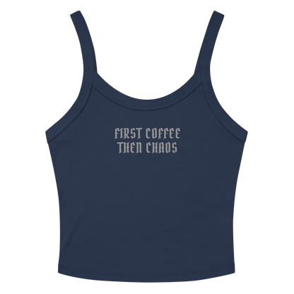 "First Coffee  Then Chaos" printed on a solid navy blend women's micro-rib tanktop laying on a flat surface amongst sunglasses and shorts