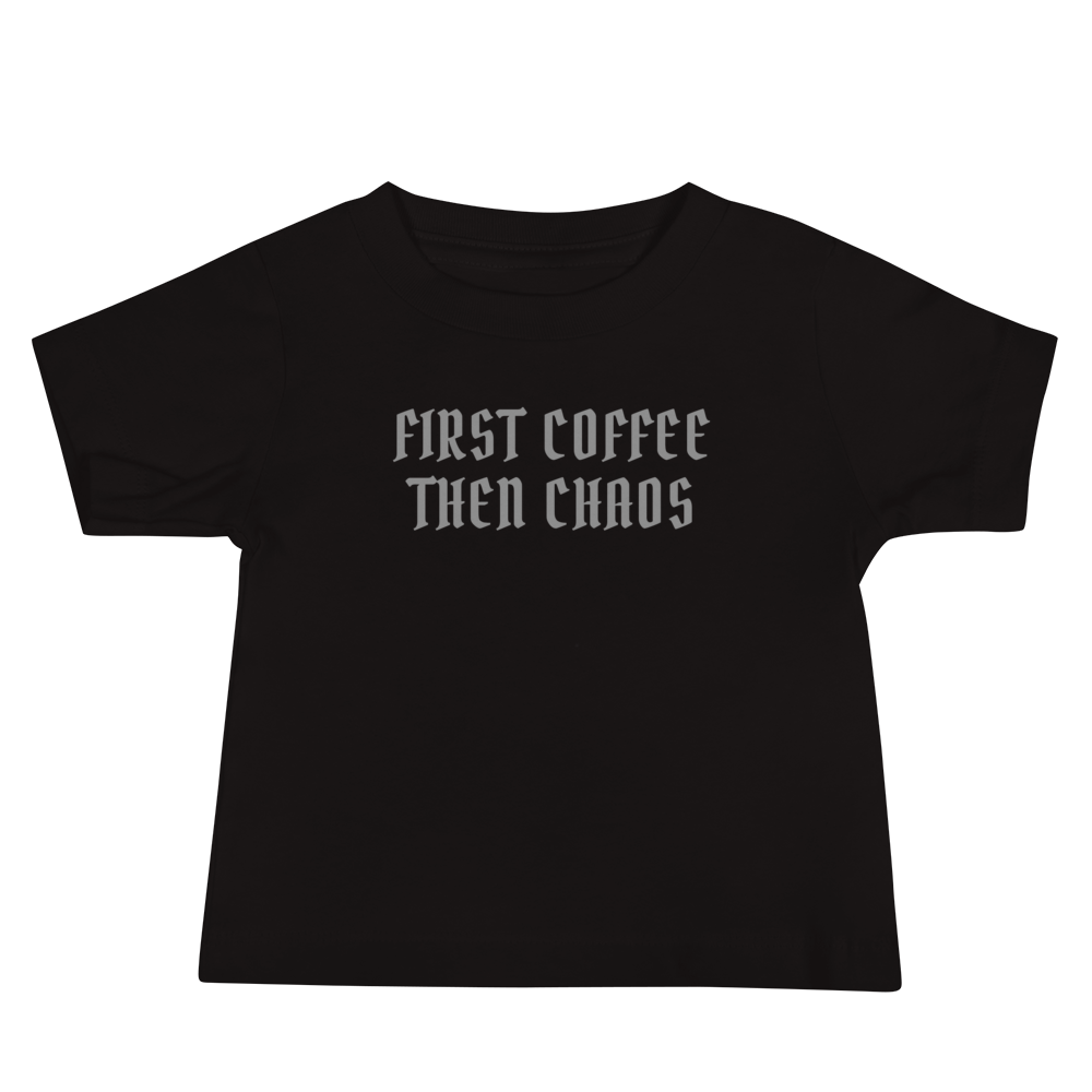 "First Coffee  Then Chaos" printed on a black baby jersey short sleeve tee laying on a flat surface