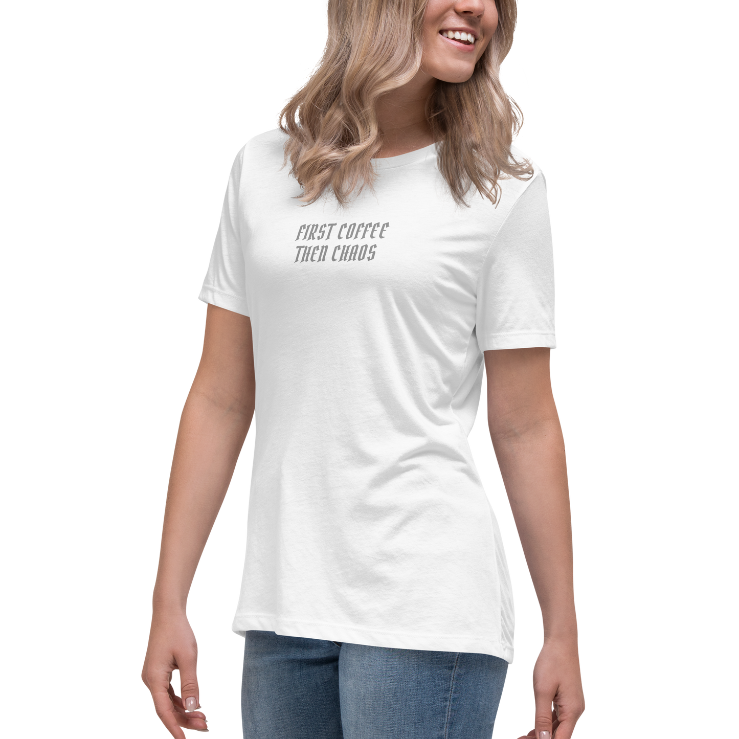 "First Coffee  Then Chaos" printed on a white women's relaxed t-shirt worn by a female