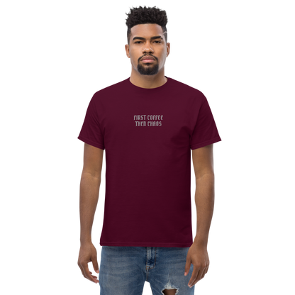 "First Coffee  Then Chaos" printed on a maroon unisex classic tee worn by a male