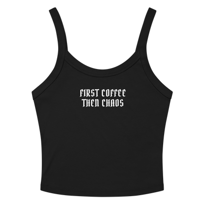 "First Coffee  Then Chaos" printed on a solid black blend women's micro-rib tanktop laying on a flat surface amongst sunglasses and shorts