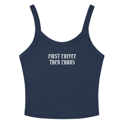 "First Coffee  Then Chaos" printed on a solid navy blend women's micro-rib tanktop laying on a flat surface amongst sunglasses and shorts