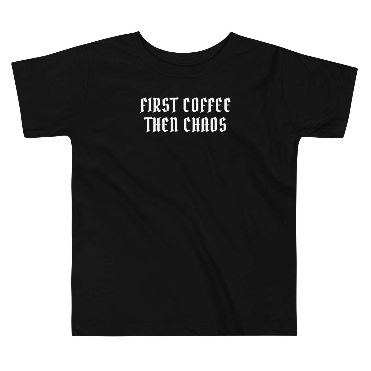 "First Coffee  Then Chaos" printed on a black toddler short sleeve tee laying on a flat surface