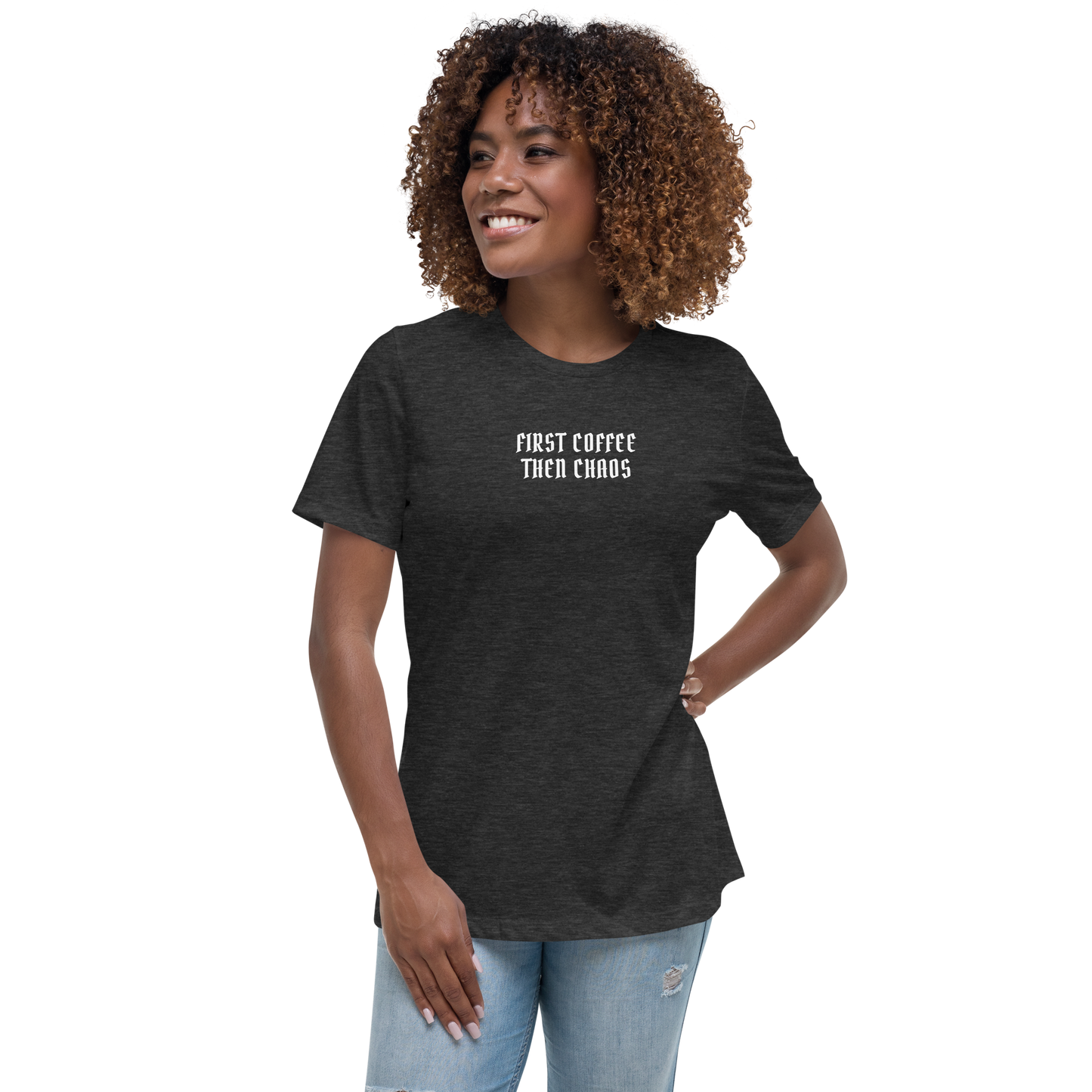 "First Coffee  Then Chaos" printed on a dark grey heather women's relaxed t-shirt worn by a female