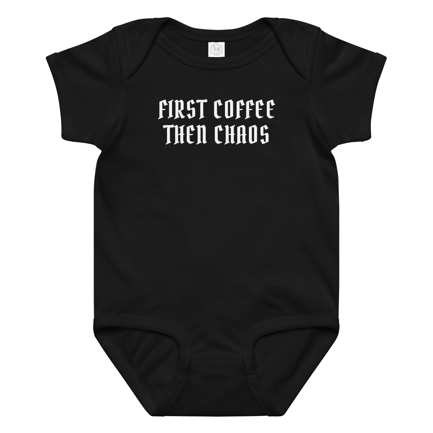 "First Coffee  Then Chaos" printed on a black baby jersey bodysuit laying on a flat surface amongst other clothes