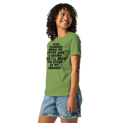 "Fuck Flowers! Bring Me Coffee And A Sword And I'll Reap The Souls Of My Enemies" printed on a leaf women's relaxed t-shirt worn by a female