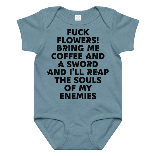 "Fuck Flowers! Bring Me Coffee And A Sword And I'll Reap The Souls Of My Enemies" printed on a vintage indigo baby jersey bodysuit laying on a flat surface amongst other clothes