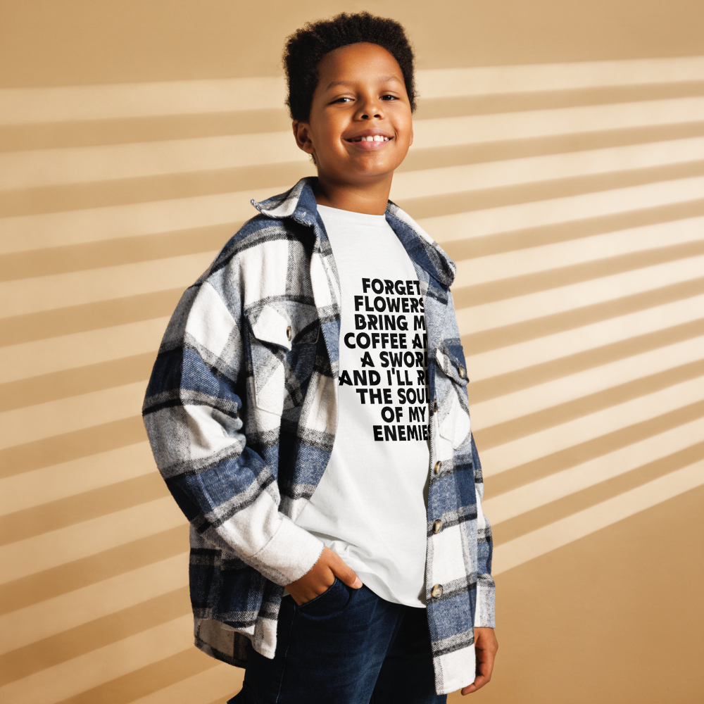 "Forget Flowers! Bring Me Coffee And A Sword And I'll Reap The Souls Of My Enemies" printed on a white youth classic tee worn by a male also wearing a jacket