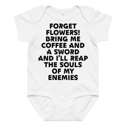 "Forget Flowers! Bring Me Coffee And A Sword And I'll Reap The Souls Of My Enemies" printed on a white baby jersey bodysuit laying on a flat surface amongst other clothes