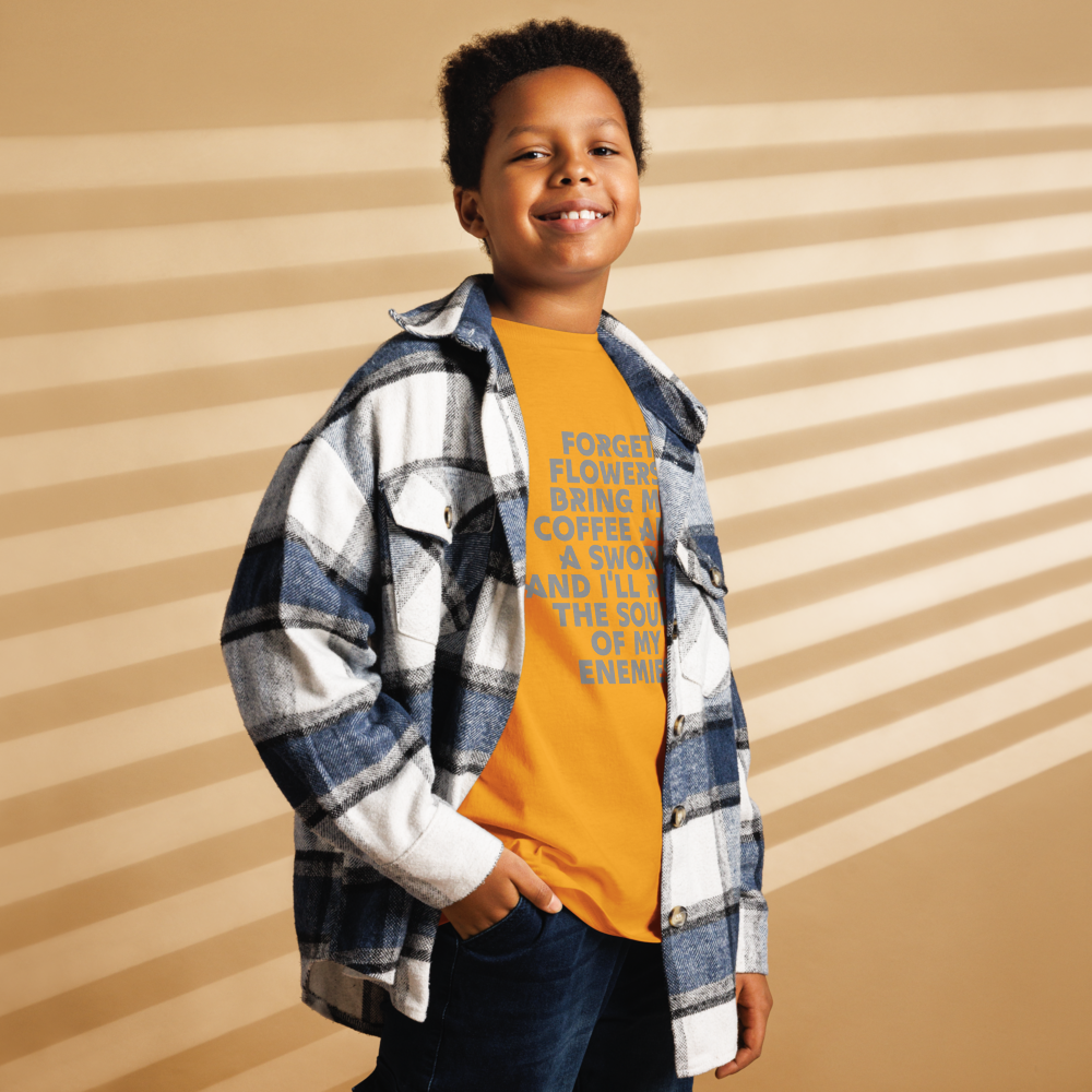 "Forget Flowers! Bring Me Coffee And A Sword And I'll Reap The Souls Of My Enemies" printed on a gold youth classic tee worn by a male also wearing a jacket