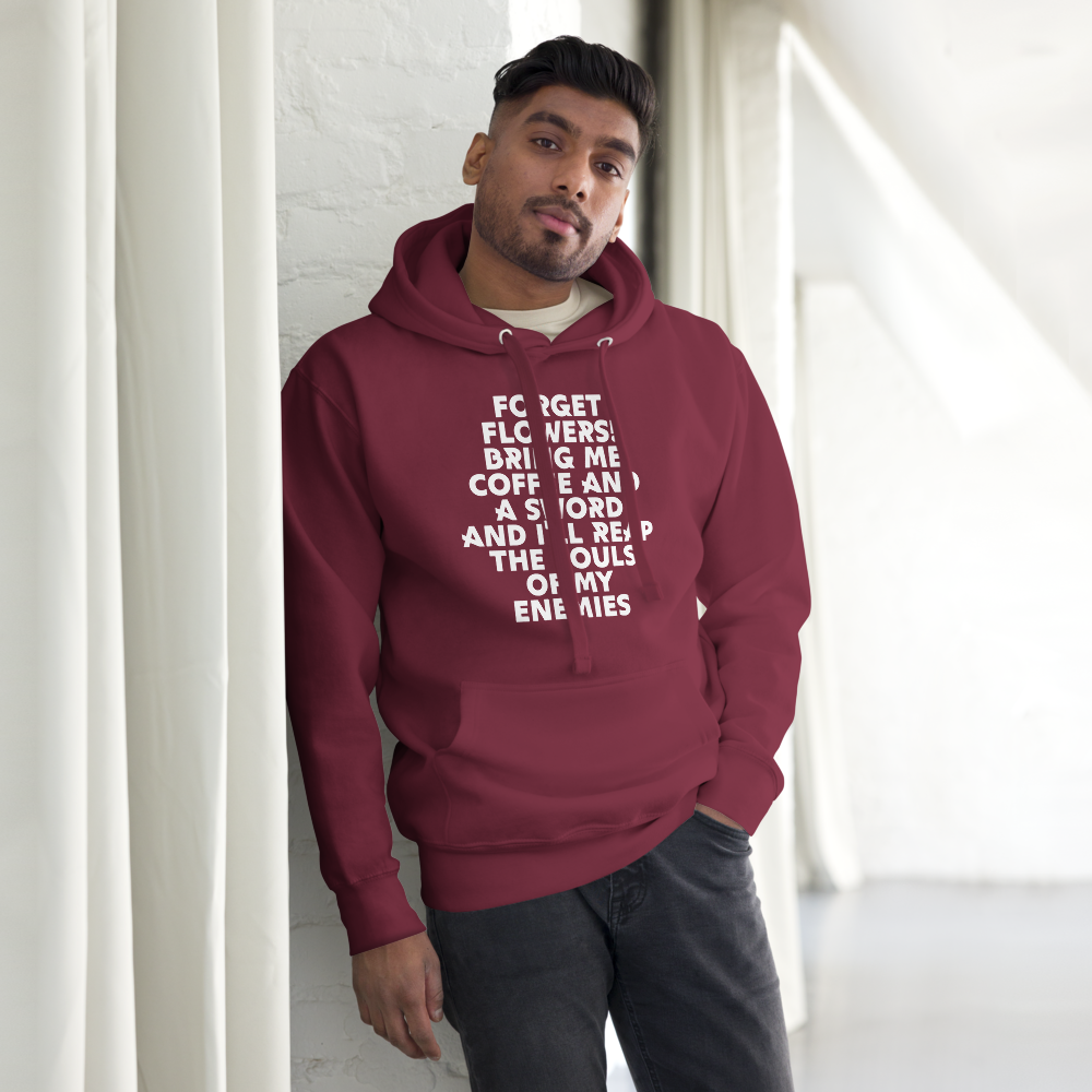"Forget Flowers! Bring Me Coffee And A Sword And I'll Reap The Souls Of My Enemies" printed on a maroon unisex hoodie worn by a male
