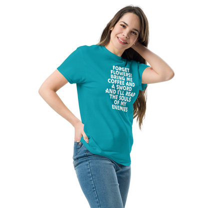 "Forget Flowers! Bring Me Coffee And A Sword And I'll Reap The Souls Of My Enemies" printed on a tropical blue unisex classic tee worn by a female