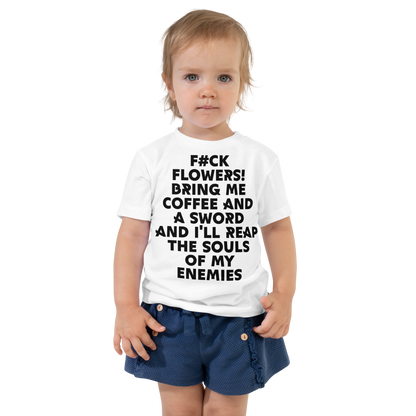 "F#Ck Flowers! Bring Me Coffee And A Sword And I'll Reap The Souls Of My Enemies" printed on a white toddler short sleeve tee worn by a female