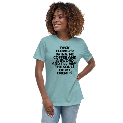 "F#Ck Flowers! Bring Me Coffee And A Sword And I'll Reap The Souls Of My Enemies" printed on a heather blue lagoon women's relaxed t-shirt worn by a female