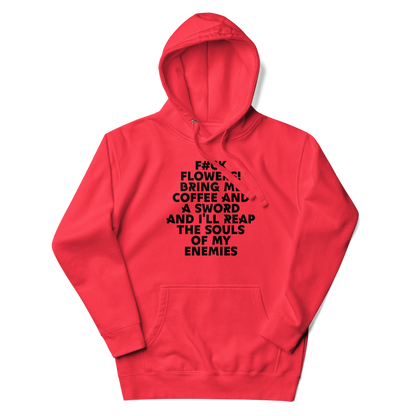 "F#Ck Flowers! Bring Me Coffee And A Sword And I'll Reap The Souls Of My Enemies" printed on a team red unisex hoodie laying on a flat surface with the hood up