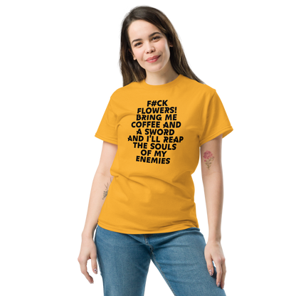"F#Ck Flowers! Bring Me Coffee And A Sword And I'll Reap The Souls Of My Enemies" printed on a gold unisex classic tee worn by a female