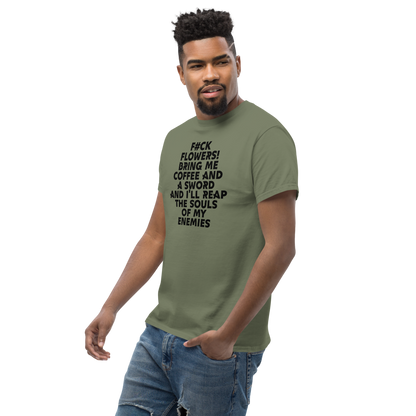 "F#Ck Flowers! Bring Me Coffee And A Sword And I'll Reap The Souls Of My Enemies" printed on a military green unisex classic tee worn by a male