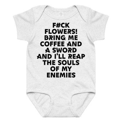"F#Ck Flowers! Bring Me Coffee And A Sword And I'll Reap The Souls Of My Enemies" printed on a ash baby jersey bodysuit laying on a flat surface amongst other clothes