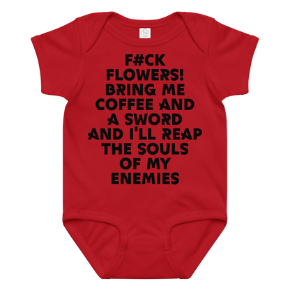 "F#Ck Flowers! Bring Me Coffee And A Sword And I'll Reap The Souls Of My Enemies" printed on a red baby jersey bodysuit laying on a flat surface amongst other clothes