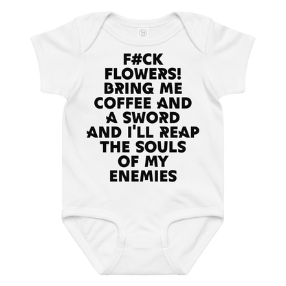 "F#Ck Flowers! Bring Me Coffee And A Sword And I'll Reap The Souls Of My Enemies" printed on a white baby jersey bodysuit laying on a flat surface amongst other clothes