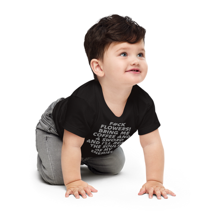"F#Ck Flowers! Bring Me Coffee And A Sword And I'll Reap The Souls Of My Enemies" printed on a black baby jersey short sleeve tee worn by a male who is crawling