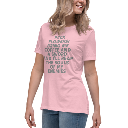 "F#Ck Flowers! Bring Me Coffee And A Sword And I'll Reap The Souls Of My Enemies" printed on a pink women's relaxed t-shirt worn by a female