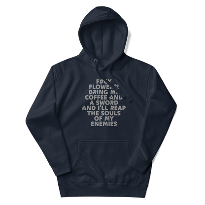 "F#Ck Flowers! Bring Me Coffee And A Sword And I'll Reap The Souls Of My Enemies" printed on a navy blazer unisex hoodie laying on a flat surface with the hood up