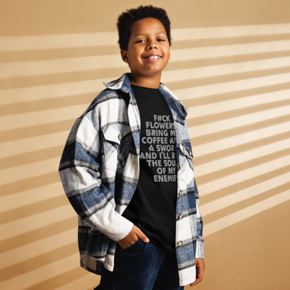 "F#Ck Flowers! Bring Me Coffee And A Sword And I'll Reap The Souls Of My Enemies" printed on a black youth classic tee worn by a male also wearing a jacket