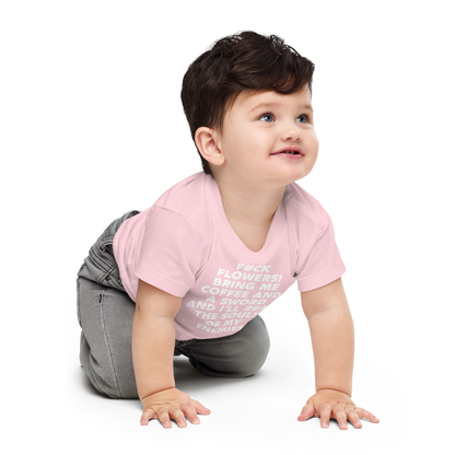 "F#Ck Flowers! Bring Me Coffee And A Sword And I'll Reap The Souls Of My Enemies" printed on a pink baby jersey short sleeve tee worn by a male who is crawling