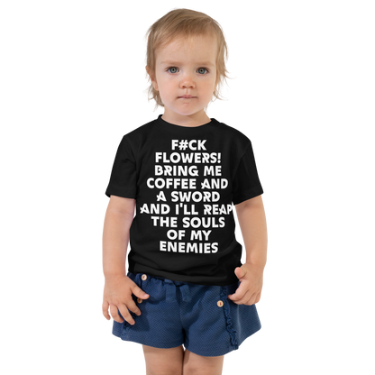 "F#Ck Flowers! Bring Me Coffee And A Sword And I'll Reap The Souls Of My Enemies" printed on a black toddler short sleeve tee worn by a female