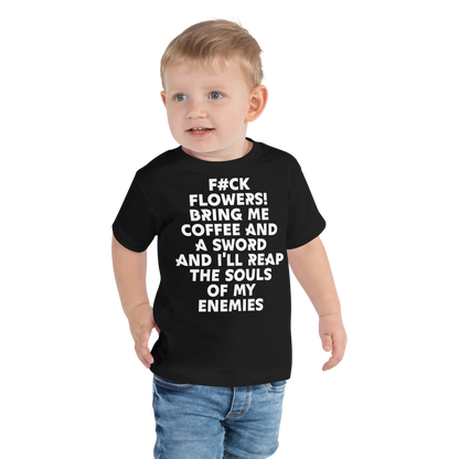 "F#Ck Flowers! Bring Me Coffee And A Sword And I'll Reap The Souls Of My Enemies" printed on a black toddler short sleeve tee worn by a male
