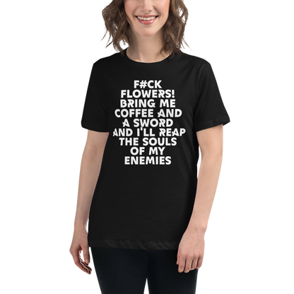"F#Ck Flowers! Bring Me Coffee And A Sword And I'll Reap The Souls Of My Enemies" printed on a black women's relaxed t-shirt worn by a female