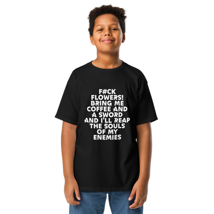 "F#Ck Flowers! Bring Me Coffee And A Sword And I'll Reap The Souls Of My Enemies" printed on a black youth classic tee worn by a male
