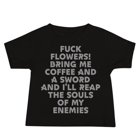 "Fuck Flowers! Bring Me Coffee And A Sword And I'll Reap The Souls Of My Enemies" printed on a black baby jersey short sleeve tee laying on a flat surface