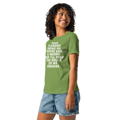 "Fuck Flowers! Bring Me Coffee And A Sword And I'll Reap The Souls Of My Enemies" printed on a leaf women's relaxed t-shirt worn by a female