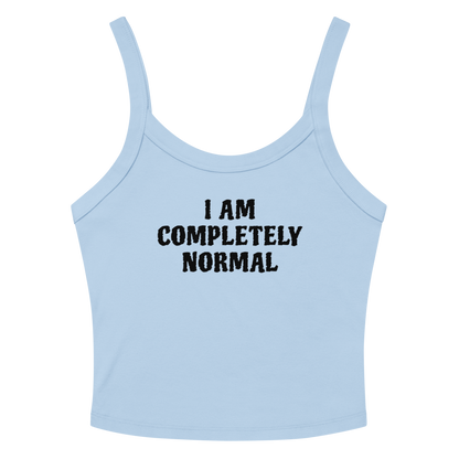 "I am completely normal" printed on a solid baby blue blend women's micro-rib tanktop laying on a flat surface amongst sunglasses and shorts