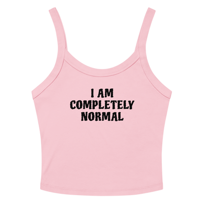 "I am completely normal" printed on a solid pink blend women's micro-rib tanktop laying on a flat surface amongst sunglasses and shorts