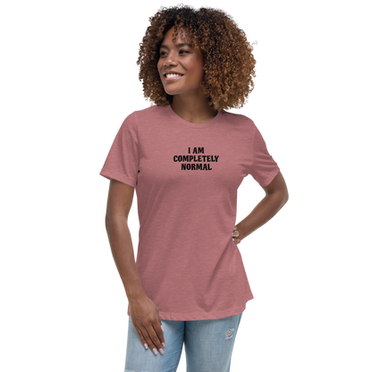 "I am completely normal" printed on a heather mauve women's relaxed t-shirt worn by a female