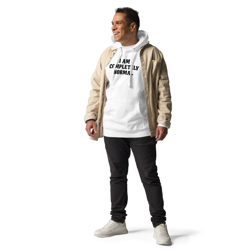 "I am completely normal" printed on a white unisex hoodie worn by a male with a jacket on top